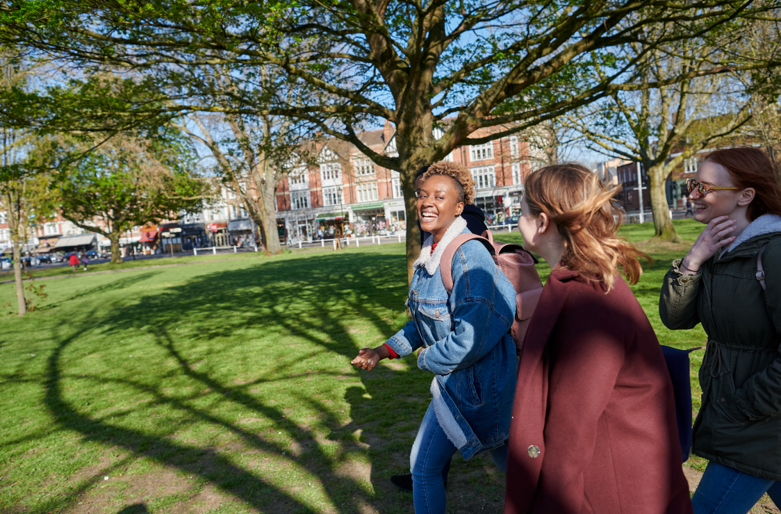 People Walking Through Ealing Green